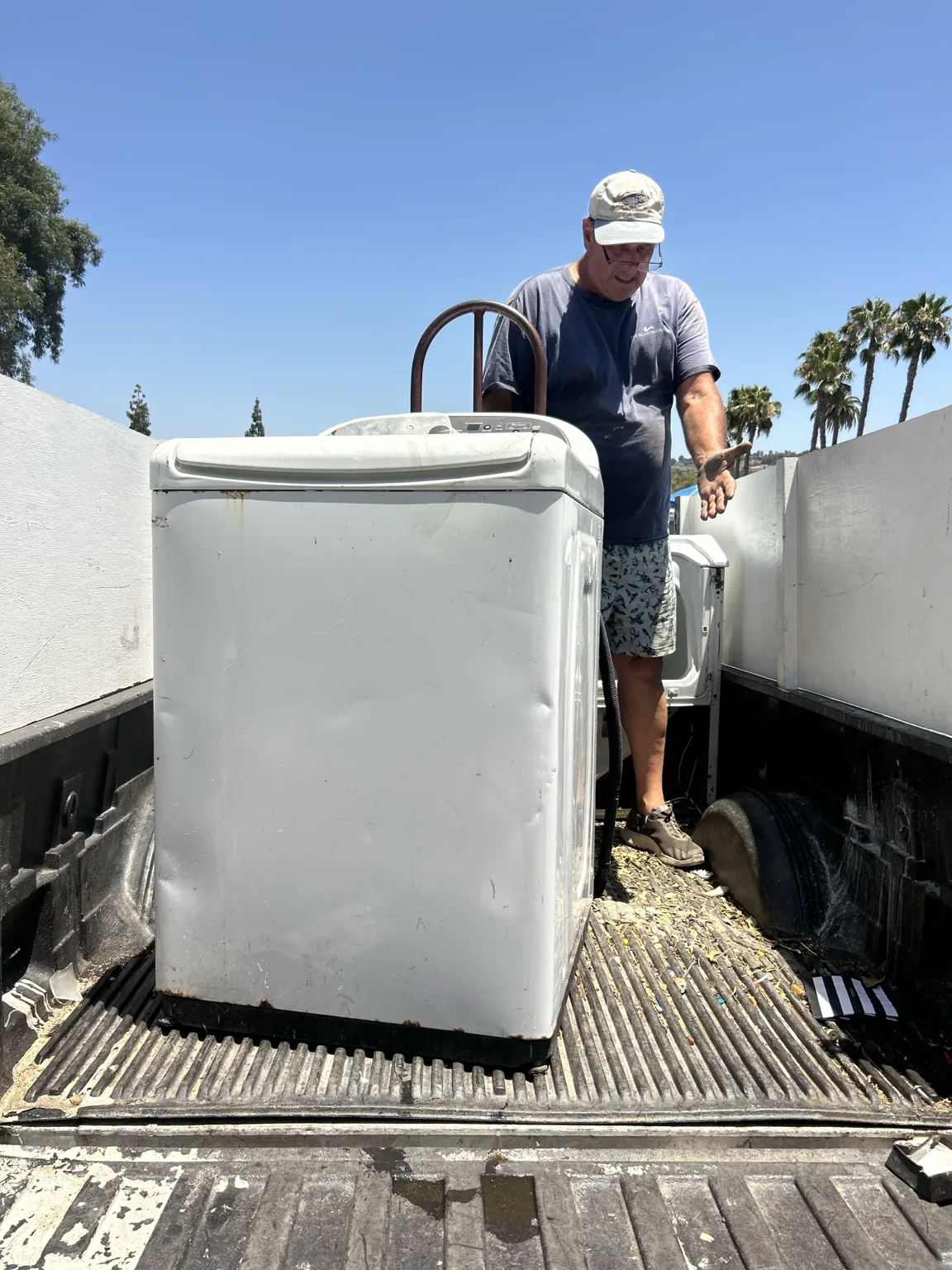 Washer and dryer loaded for appliance removal