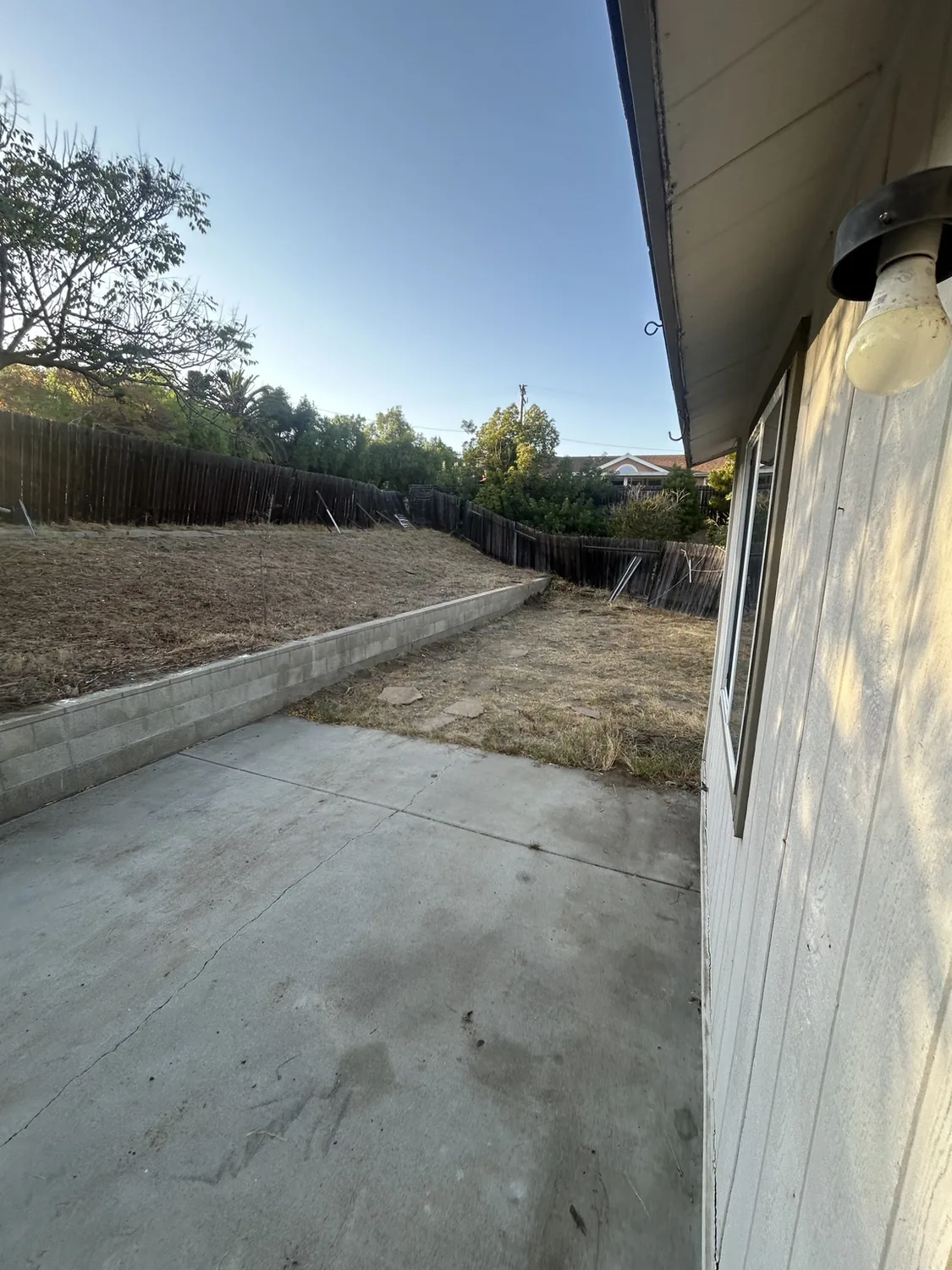 Property patio after junk and outdoor items were removed